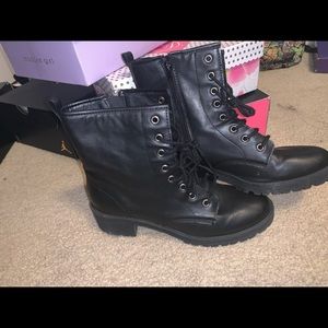 Black Combat Boot with small heel.